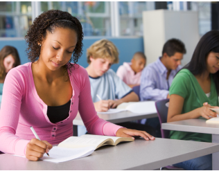 young teen taking down notes