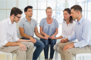 a group of people praying together