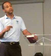 pastor talking in front